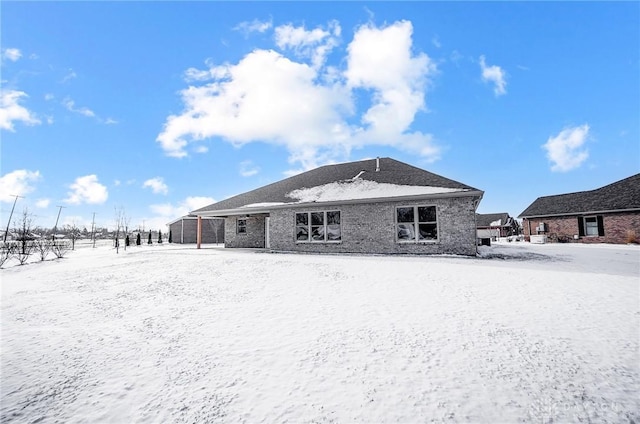 view of snow covered property