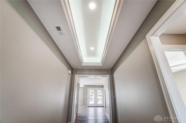 hallway with dark hardwood / wood-style flooring