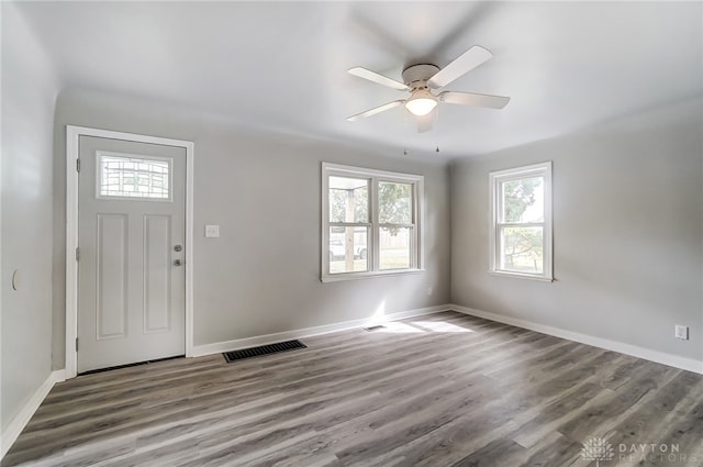 foyer with ceiling fan and hardwood / wood-style flooring