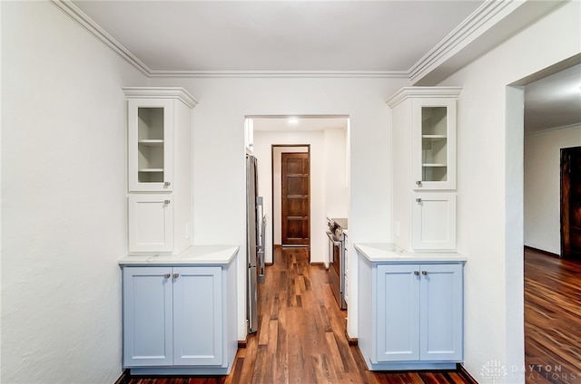 hall with ornamental molding and dark hardwood / wood-style flooring