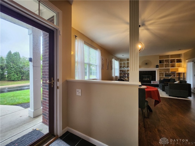 entryway with hardwood / wood-style flooring