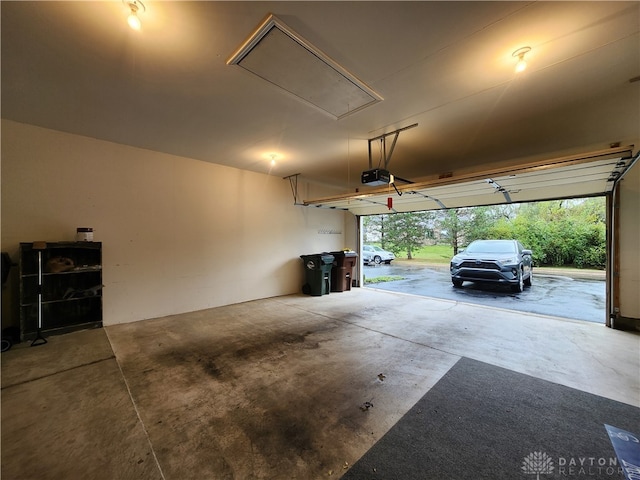 garage featuring a garage door opener