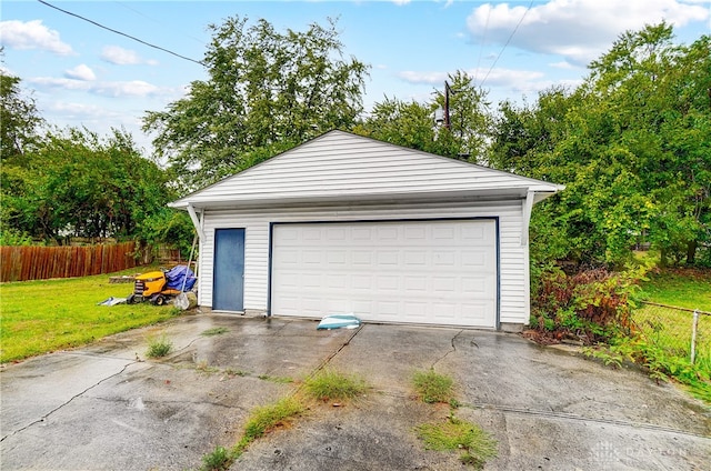 garage with a lawn