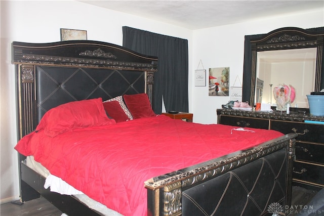 bedroom featuring hardwood / wood-style flooring