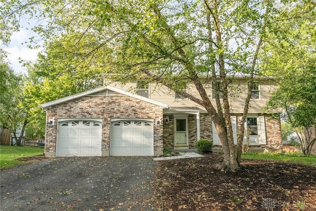 front of property with a garage