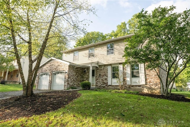 front of property featuring a garage and a front yard