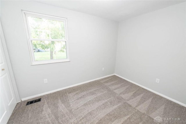 view of carpeted spare room