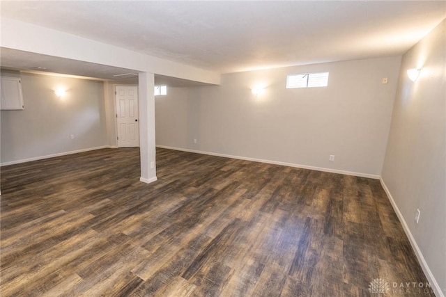 basement featuring dark hardwood / wood-style floors