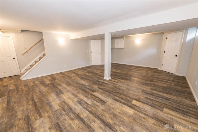 basement featuring dark hardwood / wood-style floors