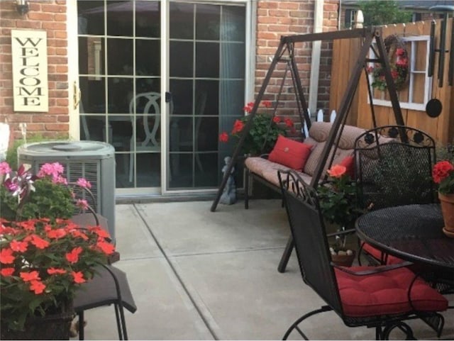 view of patio / terrace with cooling unit