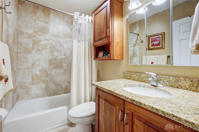 full bathroom with shower / tub combo, vanity, and toilet