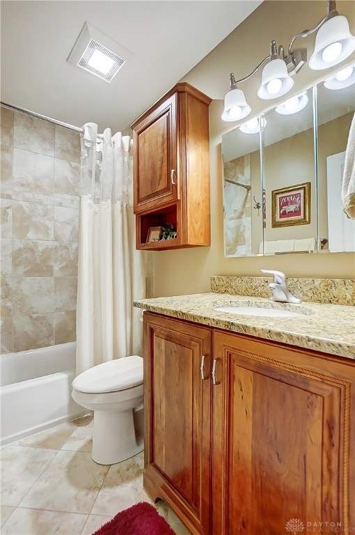 full bathroom with vanity, toilet, shower / bathtub combination with curtain, and tile patterned floors