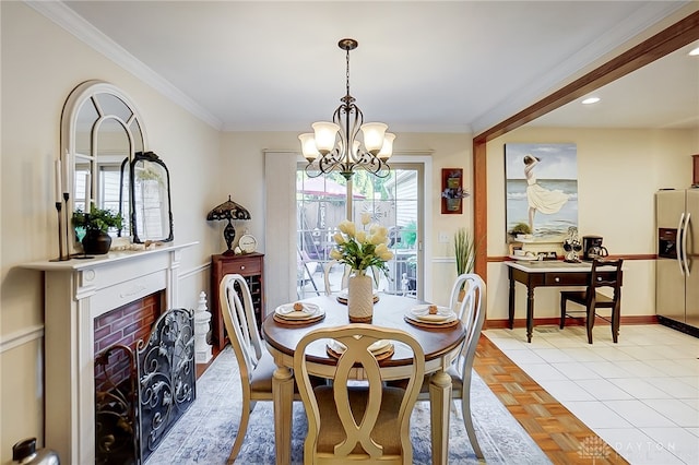 dining space featuring a brick fireplace, an inviting chandelier, crown molding, and light parquet flooring