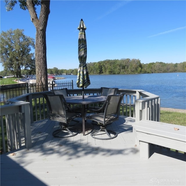 deck featuring a water view