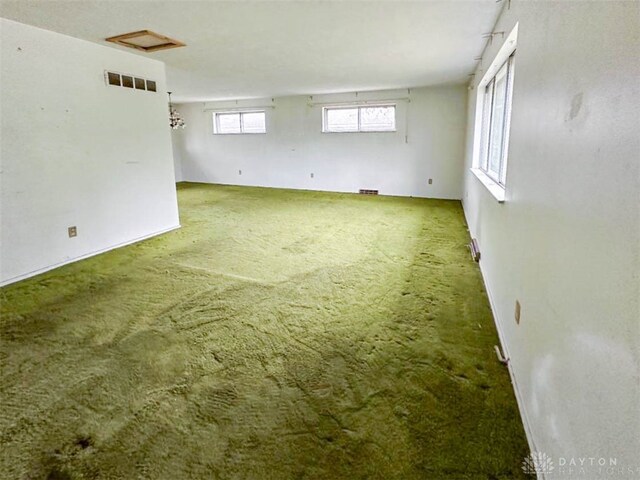 empty room with carpet flooring