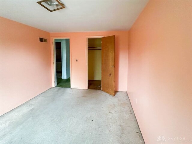 unfurnished bedroom featuring a closet