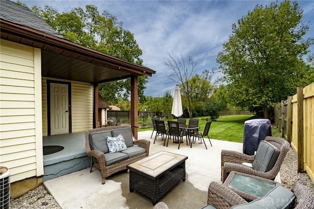 view of patio / terrace with an outdoor living space and grilling area