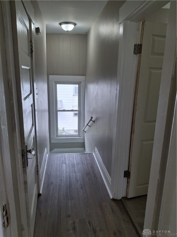 hallway featuring dark hardwood / wood-style flooring