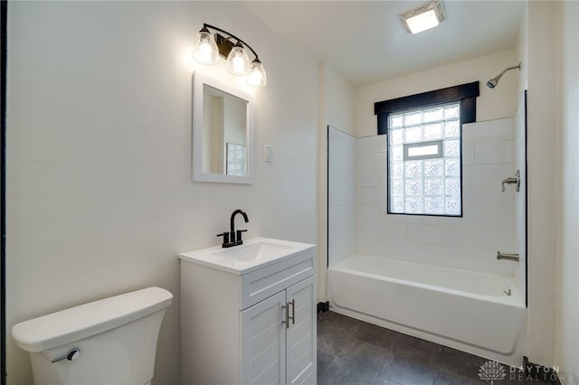 full bathroom featuring bathing tub / shower combination, vanity, and toilet