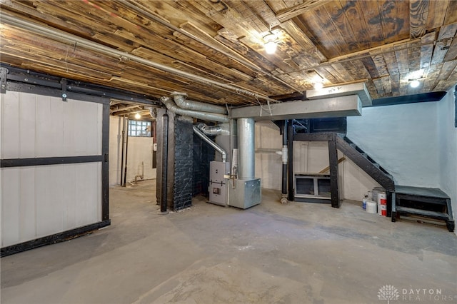 basement featuring heating unit