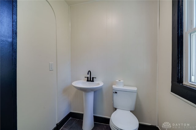 bathroom with toilet and sink