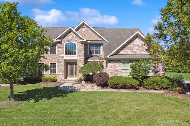 view of front facade with a front yard