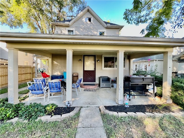 rear view of house featuring a patio area