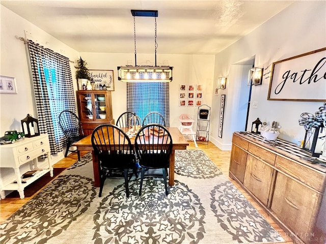 dining room featuring light wood-type flooring