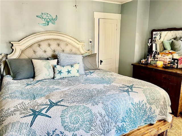 bedroom with carpet and ornamental molding