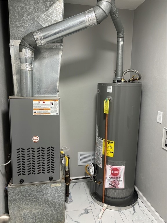 utilities with gas water heater and heating unit