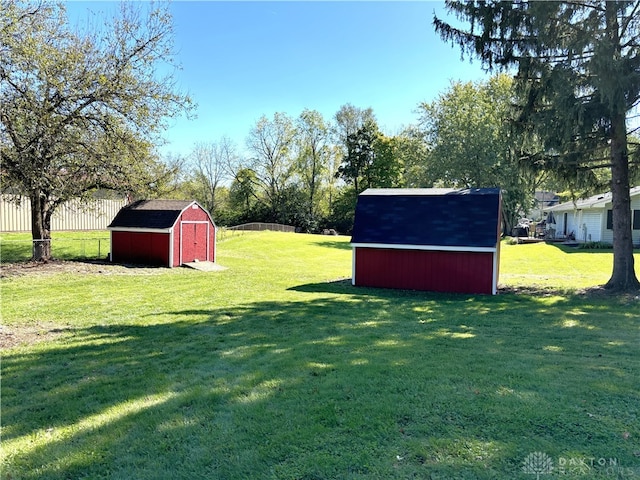 view of yard with a storage shed