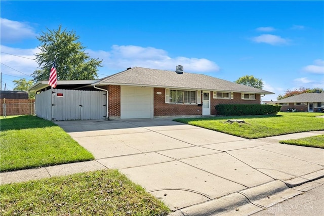 ranch-style home featuring a front lawn, driveway, fence, a garage, and brick siding