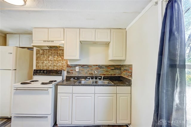 kitchen featuring white cabinets, backsplash, white appliances, wood-type flooring, and sink