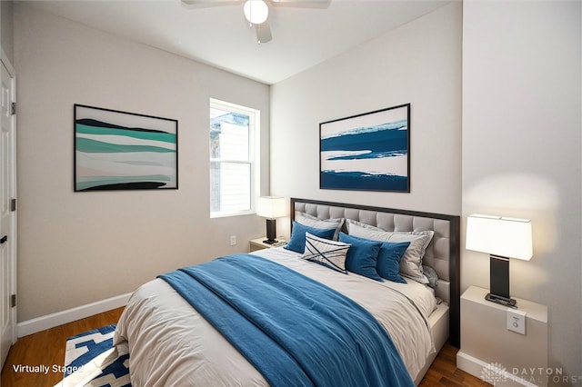 bedroom featuring hardwood / wood-style floors and ceiling fan