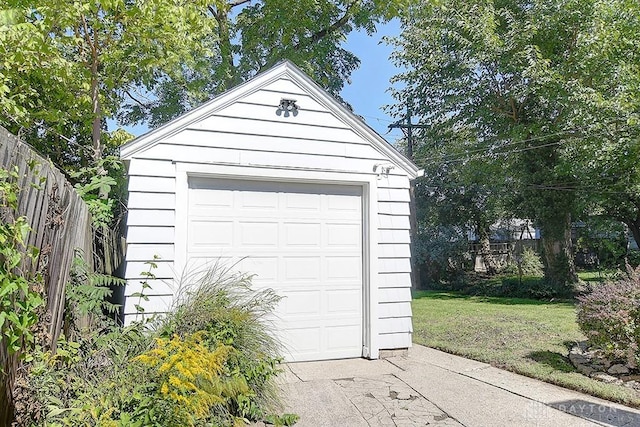 garage with a lawn