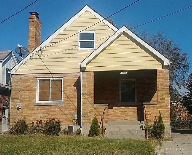 exterior space with cooling unit and covered porch