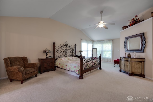 carpeted bedroom with lofted ceiling and ceiling fan