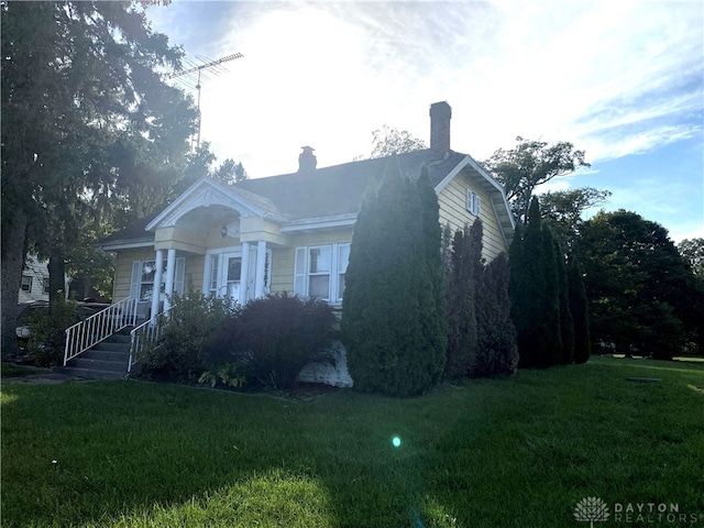 view of front of home with a front yard