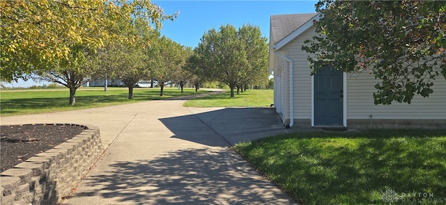 exterior space with a lawn