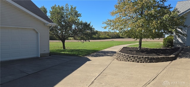 view of patio / terrace with a garage