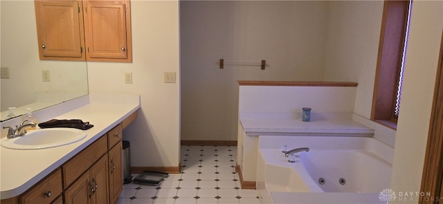 bathroom with vanity and a tub to relax in