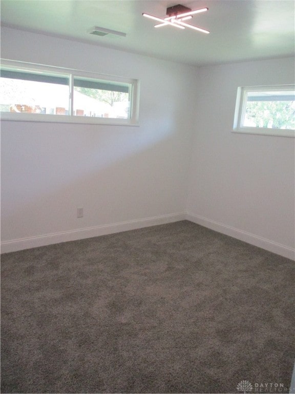 view of carpeted spare room