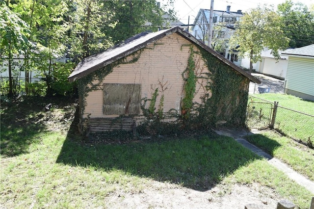 view of property exterior with a yard