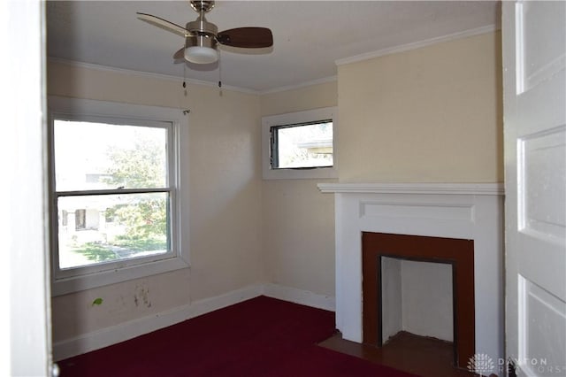 unfurnished living room featuring ceiling fan, a healthy amount of sunlight, and crown molding