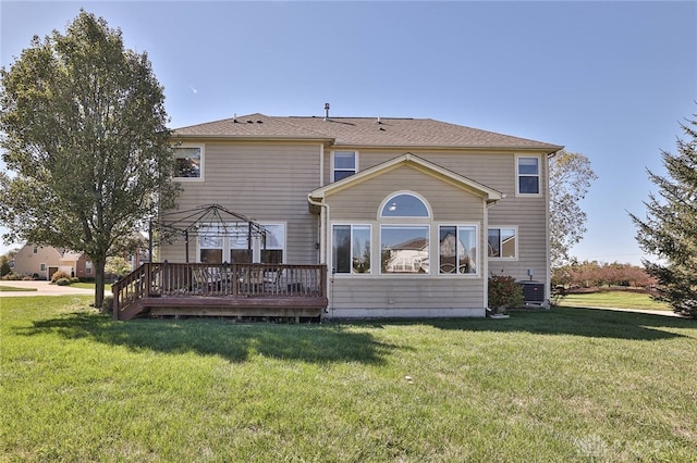 back of house featuring a gazebo, a yard, central AC, and a wooden deck