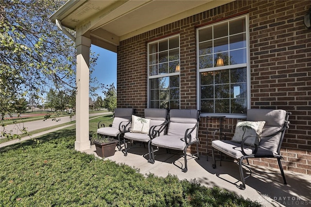 view of patio featuring a porch