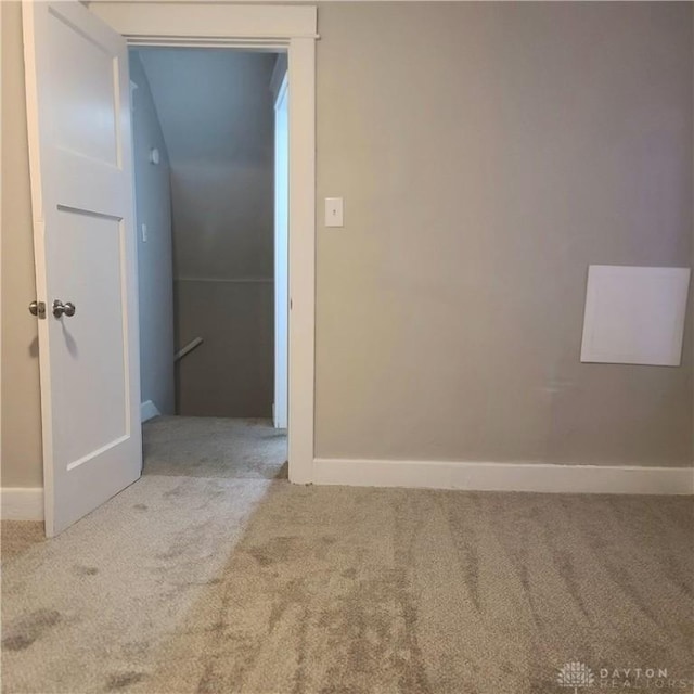 unfurnished room with carpet flooring