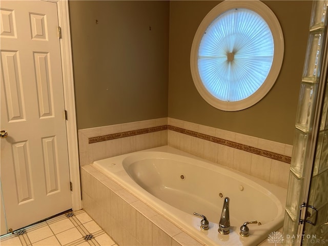 bathroom featuring tiled bath