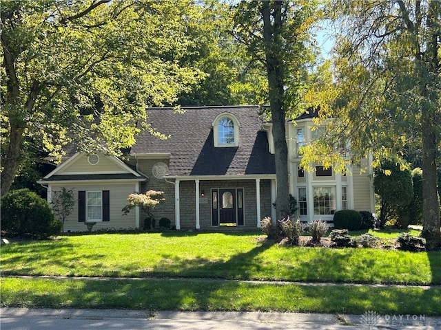 view of front of property with a front lawn