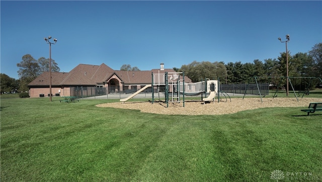 view of play area with a yard